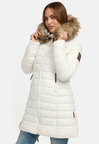White puffer coat with a fur-lined hood, featuring quilted sections, two side zip pockets, and a branded patch on the sleeve.