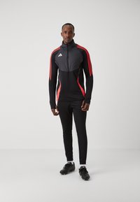 adidas Performance TIRO 24 WINTERIZED - Sportska majica - black/shock red