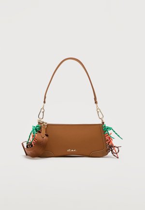 Brown leather shoulder bag with curved shape, gold hardware, and colorful green, orange, and brown braided tassels on sides.