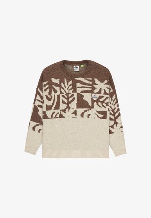 Bruine en crème gebreide trui met abstracte bladerenpatronen, ronde hals, lange mouwen en een klein logopatch op de borst.