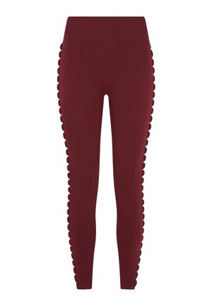Bordeauxrote Leggings mit hohem Bund und wellenförmiger Seitenverzierung. Hergestellt aus einem dehnbaren Stoff mit durchgehend glatter Textur.