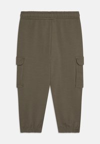 Name it NMMNEIL  - Pantalones deportivos - tea leaf