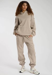 South Beach FLIGHT MODE BACK GRAPHIC  - Jersey con capucha - stone