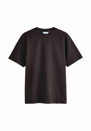 Brown short-sleeve t-shirt made of smooth cotton. Crew neck design with a relaxed fit. No visible logos or patterns. Simple and minimalistic style.
