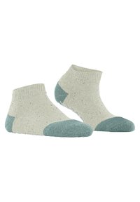 Knöchelsocken mit einem hellbeigen Körper, der gesprenkelte Akzente und eine türkisfarbene Gummisohle aufweist. Strukturierter Strickstoff, gerippter Bund.