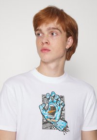 Santa Cruz FLIER HAND UNSIEX - T-shirt estampada - white