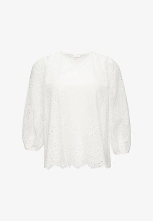 Blouse en coton blanc avec manches ballon, motif en broderie anglaise, col rond et ourlet festonné. Design simple et léger.