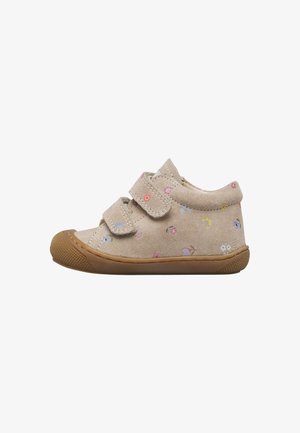 Chaussure beige pour tout-petit avec motif floral, deux sangles ajustables en Velcro et une semelle en caoutchouc marron texturée ainsi qu'un embout.