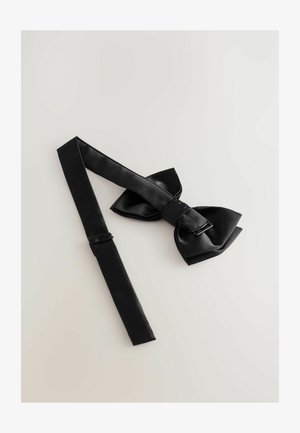 Black satin bow tie with a smooth texture, featuring an adjustable strap and a classic bow shape. The design is sleek and minimalistic.