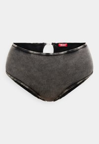 Μαύρο μαγιό σλιπ με ψηλή μέση και ραβδωτή υφή, με άνοιγμα στην πλάτη και έντονες ραφές σε αντίθετο χρώμα.