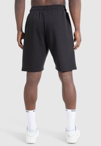 Smilodox NALE TRAINING SHORTS - Korte broeken - schwarz