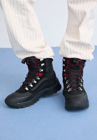 SNOW KICKER GORE TEX UNISEX - Winter boots - black