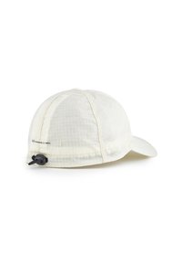 Lightweight beige cap made of textured fabric with a grid pattern, featuring a curved peak and an adjustable toggle at the back.