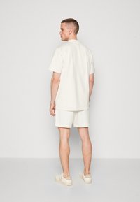 adidas Originals OLPC 2.0 - T-shirt - bas - cloud white