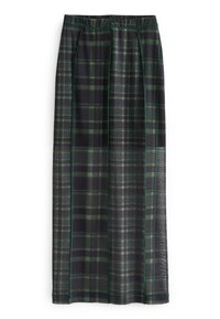 Jupe longue à carreaux avec un motif à damier vert et noir, taille élastique et texture transparente, mettant en avant des détails de couture contrastés en vert.