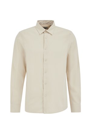 Svetlo bež srajca z dolgimi rokavi, ki ima gumbno zapenjanje spredaj, koničast ovratnik in gladko tkanino. Prilagojen kroj z ukrivljenim robom.