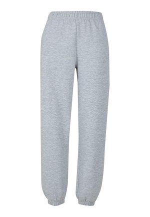 Pantalon de survêtement gris en tissu doux, avec une taille élastique, des chevilles fuselées et un design simple sans motifs ni accents visibles.