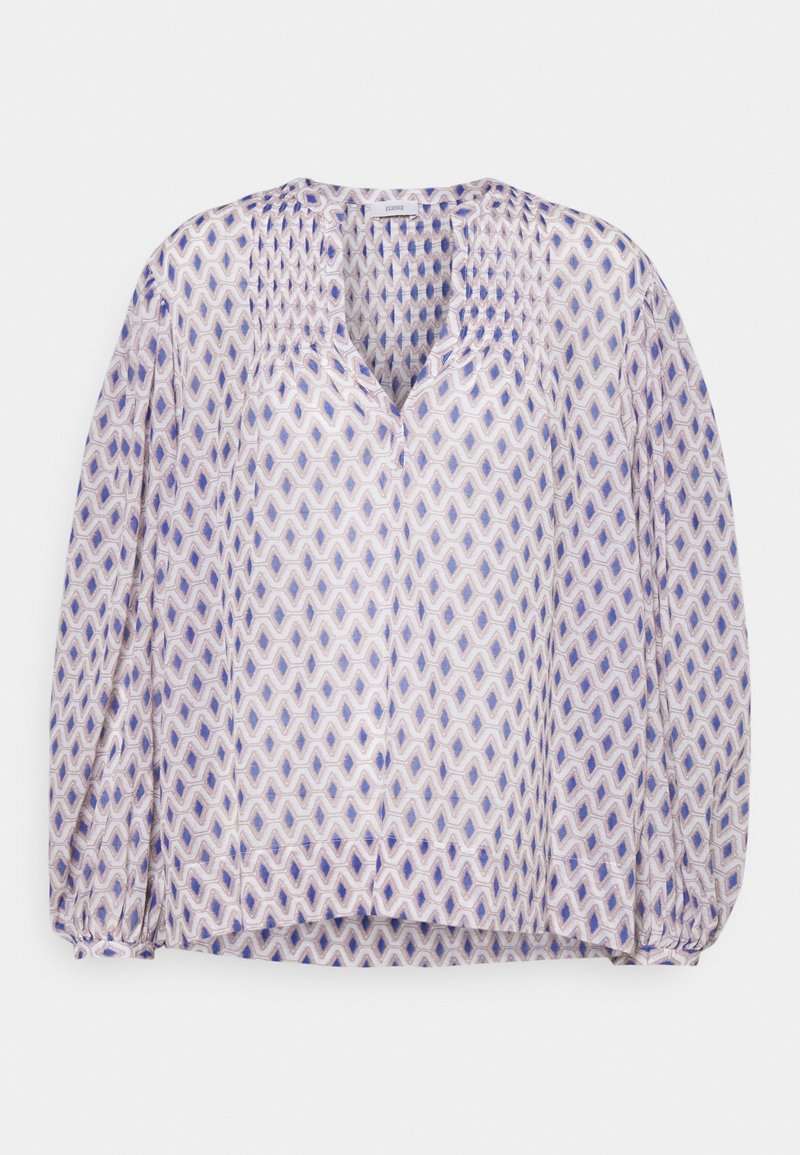 Blouse met lange mouwen met een blauw en paars geometrisch diamantenpatroon, V-hals en geplooide halslijn en manchetten, getoond tegen een witte achtergrond.