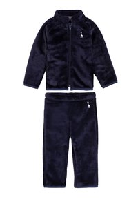 Tuta in fleece blu navy con giacca con zip e colletto alto, e pantaloni con vita elastica. Piccolo logo su entrambi i capi.