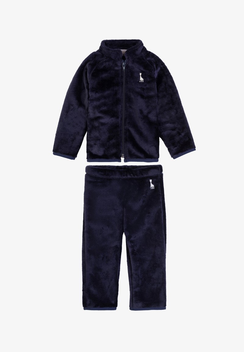 Dunkelblauer Fleece-Trainingsanzug mit einer Reißverschlussjacke mit hohem Kragen und elastischen Hosen. Kleines Logo-Detail auf beiden Teilen.