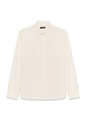 Kremna srajca z dolgimi rokavi iz gladkega blaga, z ostrim ovratnikom, zapenjanjem na gumbe spredaj in gumbi na manšetah. Enostavna, neopremljena zasnova.