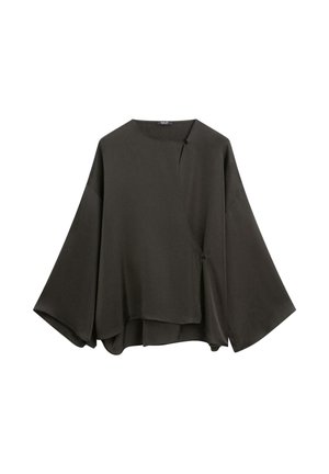 Mörkgrön, löst sittande topp med vida ärmar och rundad halsringning. Har en omlottdesign med knapptygndetalj framtill.