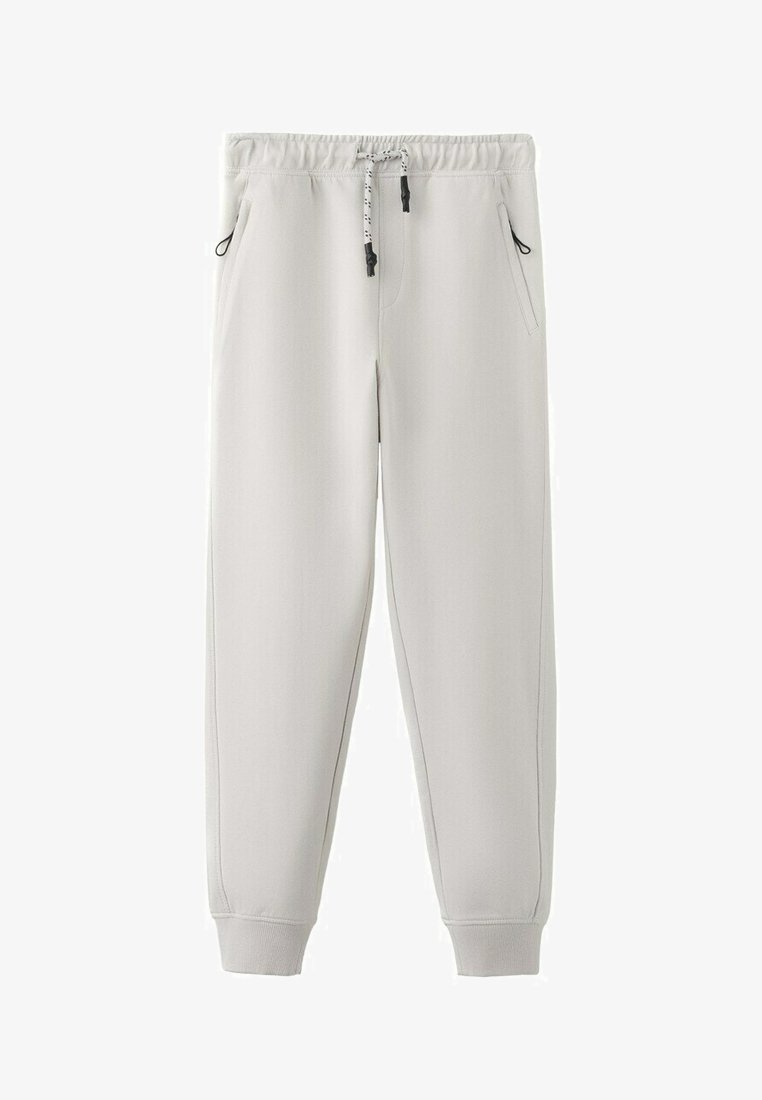 Pantalon de survêtement gris clair avec taille élastique, cordon de serrage noir et blanc, poches latérales et poignets côtelés.