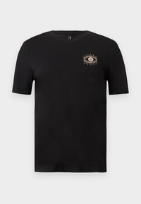 T-shirt noir à manches courtes avec un petit motif d'œil brodé beige sur la partie gauche de la poitrine sur un fond neutre.
