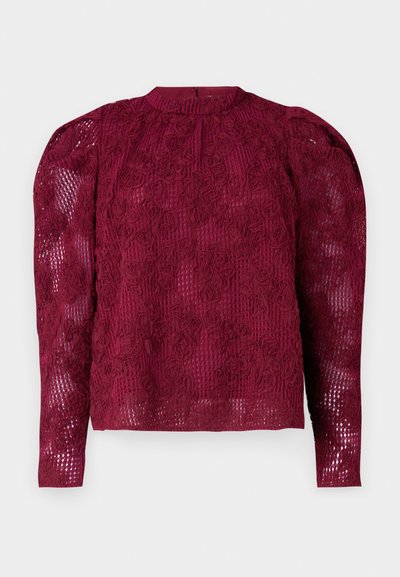 Burgundy long-sleeve top with intricate floral lace texture, high neckline, and puffed shoulders. Sheer fabric with a subtle pattern.