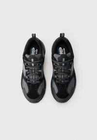 Pair of black and gray athletic sneakers with laces, viewed from above on a plain white background.