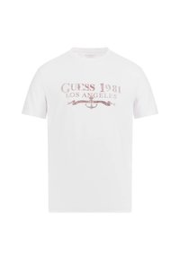 Hvid bomulds T-shirt med en rød grafik, der viser "GUESS 1981 LOS ANGELES" med dekorative bannere og et ankerdesign. Korte ærmer.