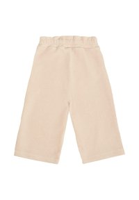 Beige corduroy broek met een wijdvallend ontwerp, voorzien van een elastische tailleband en een zachte textuur. Geen zichtbare patronen of hardwaredetails.