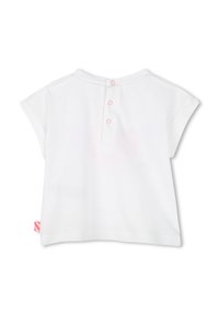 Top corto bianco in cotone con maniche corte e colletto, con tre bottoni rosa sul retro e un piccolo etichetta a strisce rosa e bianche sul lato.