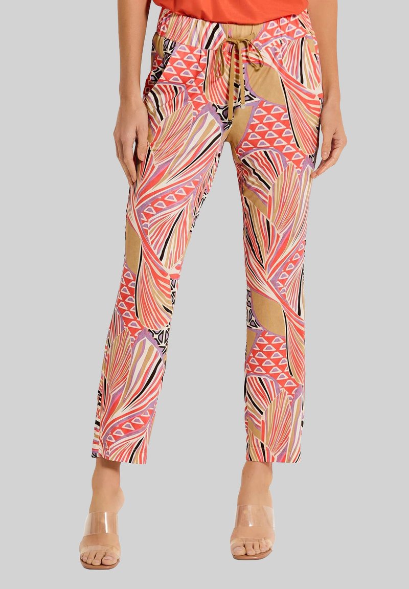 Broek in een gekleurde print met opvallende bladvormen en geometrische patronen. Gemaakt van een lichte stof met een tailleband met trekkoord en een rechte pasvorm.