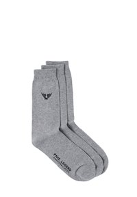 Calzini di cotone grigi con una texture liscia, dotati di un logo nero sul lato e polsini a costine, progettati per comfort e durata.