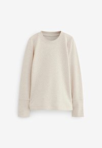 Ljus beige långärmad sweatshirt gjord av texturerad tyg. Har en rund halsringning och ribbade ärmslut för en åtsittande look.