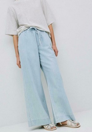 Jeans a zampa - celeste