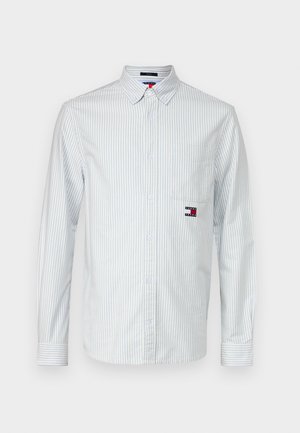 White and light blue striped long-sleeve shirt, button-down collar, single chest pocket, features Tommy Jeans logo patch.