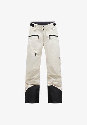 Pantalones de nieve impermeables blancos con detalles negros, dos bolsillos frontales con cremallera y un diseño de pernera ancha. Cuenta con un cierre de botón y velcro.