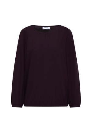 Blusa negra de manga larga con cuello redondo, ligero fruncido en los puños y el dobladillo, y un pequeño detalle de ojal en el cuello.