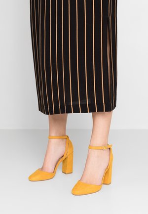 Escarpins à talons hauts - yellow