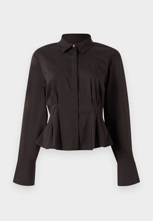 Schwarze Damenbluse mit langen Ärmeln, spitzem Kragen, verdeckten Knöpfen an der Vorderseite, taillierter Passform sowie ausladendem Saum und Bündchen.