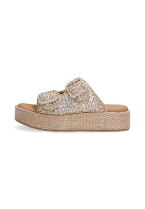 Woven straw platform sandal in beige with metallic accents and double buckle straps, featuring a textured surface and smooth inner sole.