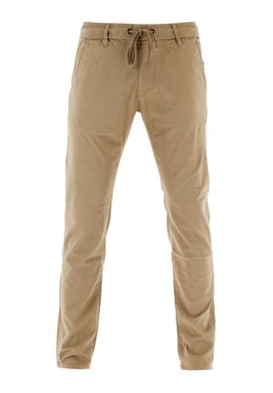 Beige Slim-Fit-Hosen mit Gürtelschlaufen und einer geflochtenen Kordelzug-Verschluss, hergestellt aus weichem Textilstoff.