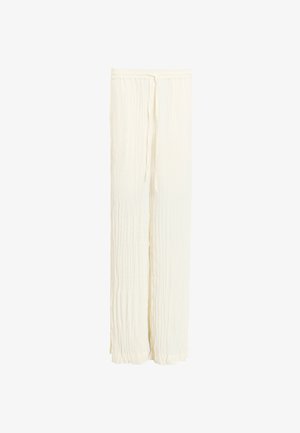 Leichte, zerknitterte weite Hose aus Stoff in Creme mit einem Kordelzugbund. Hat ein fließendes Design und eine lockere Passform.
