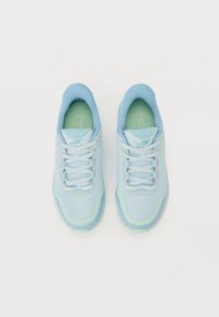 Light blue athletic shoes made of mesh and synthetic materials, featuring a rounded toe, lace-up design, and a textured outsole.