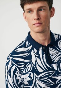 Next STANDARD - Polotričko - mottled blue