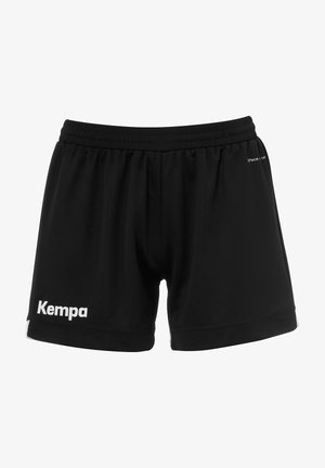 Pantaloni corti sportivi neri in materiale liscio, con una vita elastica e un logo bianco "Kempa" sulla gamba sinistra.