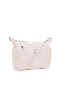 Borsa a spalla rosa chiaro realizzata in tessuto morbido, con un scomparto con zip sul retro, tracolla regolabile e design elegante.