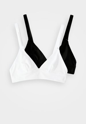 To trekantede braletter, en i hvid og en i sort. Fremstillet af glat stof med justerbare stropper og et sømløst design.